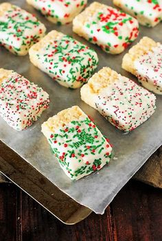 christmas sprinkle cookies on a baking sheet