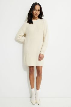 This rib knit mini dress is designed to have a relaxed fit. Features - Crewneck - Dropped shoulders - Long sleeves Size & Fit - Relaxed fit - Model is wearing size XS Materials & Care - 50% recycled polyester, 37% acrylic, 10% nylon, 3% wool - Hand wash, cold - Imported Mini Sweater, Dress Beige, Mini Sweater Dress, Knit Mini Dress, Dress Size Chart, Jumpsuit Dress, Rib Knit, New Dress, Fitness Models