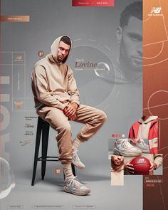 a man sitting on top of a stool next to a red ball and wearing a hoodie