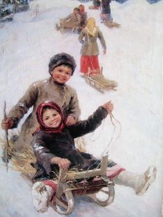 two children are sledding down a hill in the snow, with other people behind them