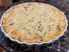 a casserole dish sitting on top of a granite counter