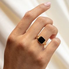 Inspired by menswear style rings, this striking and classic piece features a jet black stone set into a gleaming yellow gold band. 18k yellow gold plated Brass base Height 10 mm Band width 3 mm Square Stone Ring, Local Eclectic, Square Stone, Vermeil Jewelry, Jewelry Cleaner, Black Stone, Gold Plated Jewelry, Stone Ring, Stone Settings