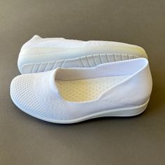 White Temple Shoes, White Cushioned Slip-ons For Sports, Comfortable White Slip-ons With Cushioned Footbed, Comfortable White Slip-on Sneakers For Light Sports, Slip-on Walking Shoes For Light Exercise, Comfortable White Slip-ons With Flat Heel, White Breathable Slip-ons With Round Toe, White Synthetic Closed Toe Slip-ons, White Non-slip Flat Heel Sneakers