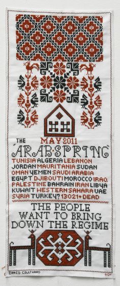 a cross stitch pattern with the words in red and black on white paper, which reads