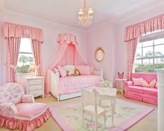 a bedroom with pink furniture and accessories in it's decorating style, including a bunk bed