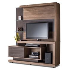 an entertainment center with a flat screen tv on it's side and shelves below