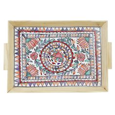 a wooden frame with an intricate design on the front and sides, holding a painting