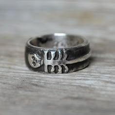 This ring is cast from hand-carved wax and inspired by mourning rings from a time past with a focus on the living this time around. The skeleton duo is set amon Skeleton Ring, Plain Ring, West Chester Pa, Skulls And Bones, West Chester, Jewelry Metal, Funky Jewelry, Metal Accessories, Skull Ring