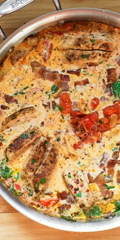 a large pizza with lots of toppings in a pan