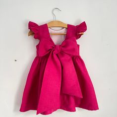 Fuchsia flowers dress Open back with big bow, baby pink dress Birthday Outfit White, Baby Lehenga, Baby Pink Dress, Linen Flower, Pink Baby Dress, White Dress Outfit, Baby Pink Dresses, Fuchsia Flowers