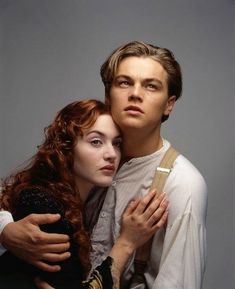 a man and woman standing next to each other in front of a blue background with the words, james carron titanic