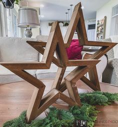 a wooden star sitting on top of a hard wood floor