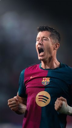 a man with his mouth wide open in front of the camera and wearing a soccer uniform