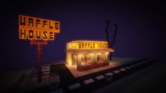 a building with a sign that says waffle house in front of it at night