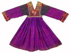 antique orient  nomadic Silk Embroidered Wedding Dress from Afghanistan. A Beautiful end of 20th century, Silk violet dress with silk embroidery wedding dress , in a  good condition.  Total width 154 cm, length 117 cm chest width 38 cm and arm length 52 cm Name : Afghan Silk Embroidered Wedding Dress Category : Antique Origins : Afghanistan Ethnic Group : Pashtun people Techniques : Embroidered Material : 90 % silk, 10 % cotton Condition: with age-related signs of wear, please take a closer look Gold Embroidered Dress, Women Silk Dress, Silk Velvet Dress, Military Costumes, Embroidered Wedding Dress, Chiffon Cocktail Dress, Violet Dresses, Silk Wedding Dress, Ankle Dress