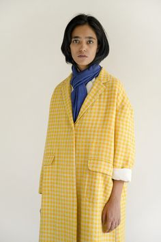 Yellow often likes to hang around with white. they sometimes mix and turn into a different shade altogether but this time they kept to their individual parts.    a woolen jacket | 100% wool    - gathers at the back  - inseam pockets  - made in india  - model is 5'8" and wearing a s / m size    the colour in the photograph may vary slightly from the actual product as it is shot in natural light.    approximate garment     measurements:  small / medium: length: 44" chest: 50" shoulder: 22.5"  larg Spring Wool Coat, Oversized Wool Blazer For Spring, Yellow Wool Long Sleeve Outerwear, Oversized Wool Coat For Spring, Designer Outfits Woman, The Photograph, Outerwear Jackets, Medium Length, The Colour