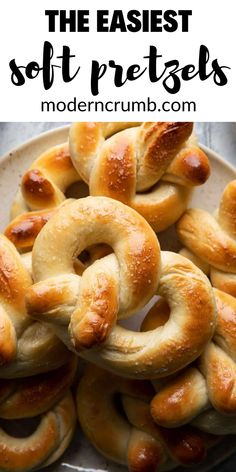 some pretzels are sitting on a plate and ready to be eaten by someone