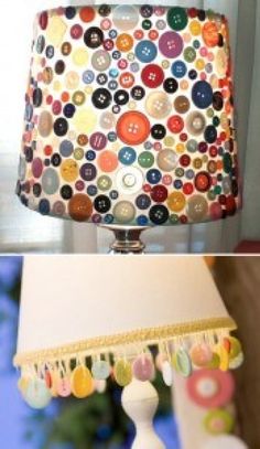 the lamp is decorated with buttons and tassels on it's lampshade