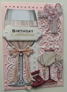 a birthday card with an image of a wine glass and other items on the front