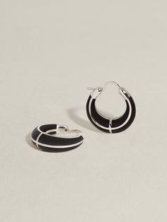 A timeless iteration on our bestselling, signature Arc Hoops — integrating strikingly inky black onyx inlay. These softly rounded, signature hoops are designed for daily wear, measuring approximately 19mm in diameter with a total weight of 9.5 grams (gold), and 7.5 grams (silver). Available in 100% recycled 14k gold only. Explore the Chess capsule for more pieces incorporating black onyx. Jeweled Earrings, Pretty Jewellery, Black Onyx, Earings Piercings, Onyx, Fine Jewelry, Yellow Gold, White Gold, Sterling Silver