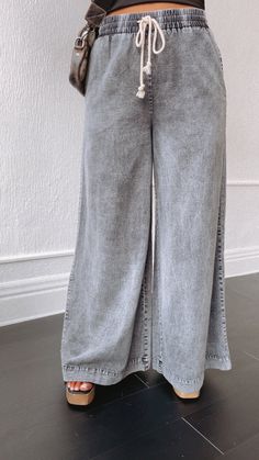 Hit the streets of style wearing these Mix It Up Mineral Washed Wide Leg Pants! With a mineral wash and wide-legs, you'll be sure to turn heads no matter the occasion. Make 'em your go-to for a unique look! Mineral washed Wide leg Drawstring Elastic Waist Functional pockets 100% Cotton Measurements: (Approximate. Measured lying flat. ** Elastic waist adds up to 4" Stretch!!) S Waist 28" Hip 41" Rise 12" Inseam 30" M Waist 30" Hip 43" Rise 12" Inseam 30" L Waist 32" Hip 45" Rise 12" Inseam 30" Mo Wide Leg Pants Black, Everyday Chic, Wide Legs, Chic Boutique, Pants Black, Black Media, The Streets, Leg Pants, Black Pants