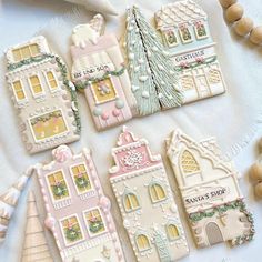 several decorated cookies sitting on top of a table