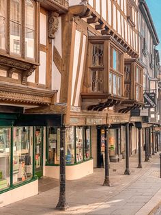 a row of buildings on the side of a street