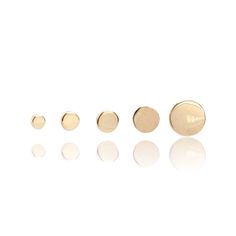 Stack these solid 14k gold discs for the ultimate minimalist look. Our threadless flat back studs are so comfortable you won't even feel them and so secure that you'll never lose one either. Item Details Material: 14k solid recycled gold Size: 2 / 2.5 / 3 / 4 / 5mm Flat Backing: 1mm diameter (18GA) Flat Backing Length: 7mm Sold as a single or pair Our 14k solid gold pieces are made to last forever. 14k gold will not oxidize or discolor, so you can wear your jewelry every day, everywhere. Minimalist Yellow Gold Round Nose Studs, Minimalist Everyday Round Nose Studs, Minimalist Round Internally Threaded Nose Studs, Classic Gold Round Nose Studs, Gold Minimalist Internally Threaded Nose Studs, Minimalist Round Nose Studs, Minimalist Gold Round Piercings, Gold Minimalist Piercings, Cartilage Piercings