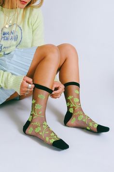 The Petal sheer ankle features a bold neon floral design perfect for adding a pop of color. A lightweight ankle-length sock with a reinforced toe and heel. SizeOne Size Fits Most, W 7-10 Design+ 200 Needle+ Ankle+ Reinforced toe & heel+ Seamless toe+ Premium Japanese Nylon Content + Care+ Premium Combed Cotton+ Wash Cold/Dry Low+ Imported Stretch Green Socks For Summer, Trendy Multicolor Socks For Spring, Trendy Green Socks For Spring, Trendy Party Socks For Spring, Casual Nylon Socks For Summer, Sheer Socks For Party In Summer, Black Party Socks For Spring, Trendy Summer Party Socks, Trendy Mesh Socks For Spring