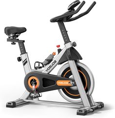 an exercise bike is shown with the seat up on it's front wheel and side view