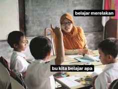 a woman sitting at a table with children in front of her and pointing to the side