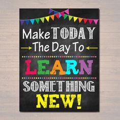 a chalkboard sign that says make today the day to learn something new