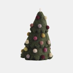 a felt christmas tree ornament with pom - poms