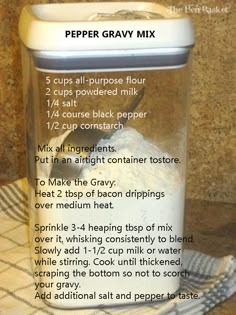 ingredients for pepper gravy mix in a blender on a towel with text