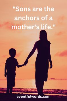 a woman holding the hand of a young boy while standing on top of a beach