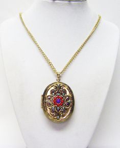 "Large Gold Plated Oval Vintage Cabochon Treasure Locket Pendant Necklace This necklace set is made with 38mm x 46mm gold plated oval vintage old world double sided locket with decorative cabochon that you can open to put your pictures or other keepsake items in. It hangs from a 21\" gold plated chain and fastens with a gold lobster clasp.  Necklace Length: 21\"  Closure: Gold Lobster Clasp Nickel & Lead Compliant @0849" Beautiful Pearl Necklace, Pearl Necklace Earrings, Locket Pendant Necklace, Clasp Necklace, Bracelet Earring Set, Purple Glass, Locket Necklace, Gold Plated Chains, Gold Fashion