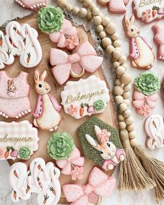 some decorated cookies are sitting on a table