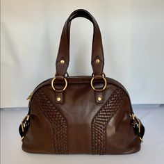 Brand New With Tags, Ysl Brown Leather Tote With Shoulder Strap - Rare & In Perfect Condition! 15” Inch Length 15” Inch Height (With Handles) 8” Inch Wide Handles 7.5” Inches Height Removable Strap 34” Inches Length Silk Lining - Perfect Condition Gold Hardware Braided Leather Forms Signature Y Outside Bag Side Buckles Interior Side Zip Side Pouch Comes With Duster Bag & Ysl Certificate Of Authenticity Purchased At Saks In San Francisco Buy With Confidence! Price Is Firm Vintage Ysl Purse, Ysl Tote Bag, Ysl Tote, Bag Ysl, Vintage Ysl, Yves Saint Laurent Bags, Brown Leather Totes, Braided Leather, Hand Bags