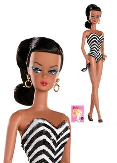 a barbie doll wearing a black and white swimsuit