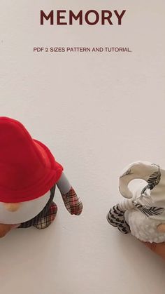 two stuffed animals wearing hats on top of each other with the words memory above them