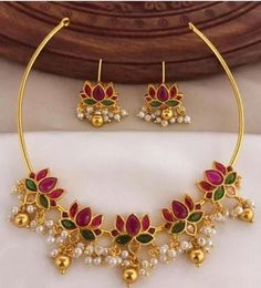 Material:- Brass, Gold Platted Pack- Necklace Set With Earrings These Beautiful Gold Platted Necklace Best for gifting and personal use, You can gift your Girlfriend, Mother, Sister , Relatives , Neighbours etc. Combine it with Matching Dress and be the Limelight of every Occasion ( Diwali, Birthday, Anniversary, Christmas, Any Ritual Festival). Suitable for all Occasions. a)These are very skin Friendly. b)The plating is Non- Allergic and safe for all Environment. Gift for Her, Best Friend Gift, Gift Ideas, Valentines Day Gift,Teacher appreciation Gift, Girl Friend Gift, Friendship Gift, Teacher Gift, Mother's day Gift from Daughter, Christmas Gift, Engraved, Gift for Her, Anniversary Gift for Wife, Anniversary Gift for Girlfriend, Valentines Day Gift for Him, Birthday Gift for Him, Gradua Diwali Gift Temple Choker Necklace, Handmade Gold-plated Temple Necklace Gift, Traditional 22k Gold Choker As Gift, Traditional 22k Gold Choker Gift, Lotus Necklace Indian, Lotus Necklace, Graduation Gifts For Him, South Indian Jewelry, Antique Jewelry Indian