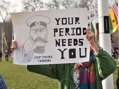 a man holding up a sign that says your period needs you with a drawing of a sailor on it