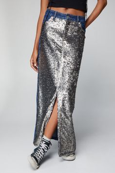 Turn heads. Feel like a walking disco ball when you step out in our denim maxi skirt, made in a high quality denim fabric, with a straight silhouette, and sparkling sequin detailing on the front panel. Style it with a crop top and sandals in the summer, or a sweatshirt and chunky boots for interseasonal wear. Premium Sequin Panel Denim Maxi Skirt High Quality Denim Fabric Flattering Mid Rise Waistline Comfortable Relaxed Fit Unique Sparkling Sequin Panel Pocket Features Model wears a size S (US size 6/UK size 10). Maxi Sequin Skirt, Denim Maxi, Denim Maxi Skirt, Halterneck Dress, Chunky Boots, Swimwear Sale, Going Out Dresses, Disco Ball, Petite Dresses