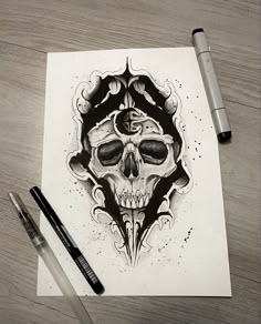 a drawing of a skull with an ornate design on it