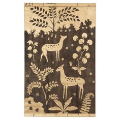 an old wall hanging with deers and flowers on it