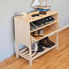 ✨ Handcrafted Wooden Shoe Rack | Multi-Level Storage | Modern & Minimalist Entryway Organizer  Introducing a handcrafted wooden shoe rack designed to add elegance and practicality to your home. Made entirely from premium birch plywood, this eco-friendly and minimalistic organizer offers four levels of shoe storage. The unique design includes a top shelf for decor or accessories, a middle section that opens with a tilt for storing additional pairs of shoes, and a lower rack with wave-shaped slots Wooden Shoe Rack Designs, Storage Minimalist, Minimalist Entryway, Modern Shoe Rack, Wooden Shoe Cabinet, Entryway Organizer, Wooden Shoe Racks, Entryway Shoe, Wooden Shoe