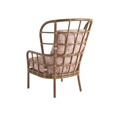 the chair is made out of bamboo and has pink patterned fabric on it's back