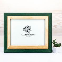 a wooden frame with a plant next to it