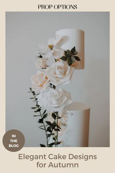 a white wedding cake with flowers on top and the words elegant cake designs for autumn