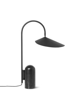 a black lamp on a white background